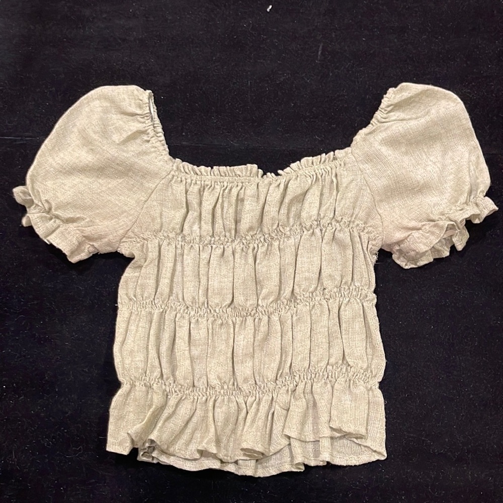 Green smocked short sleeve women’s top